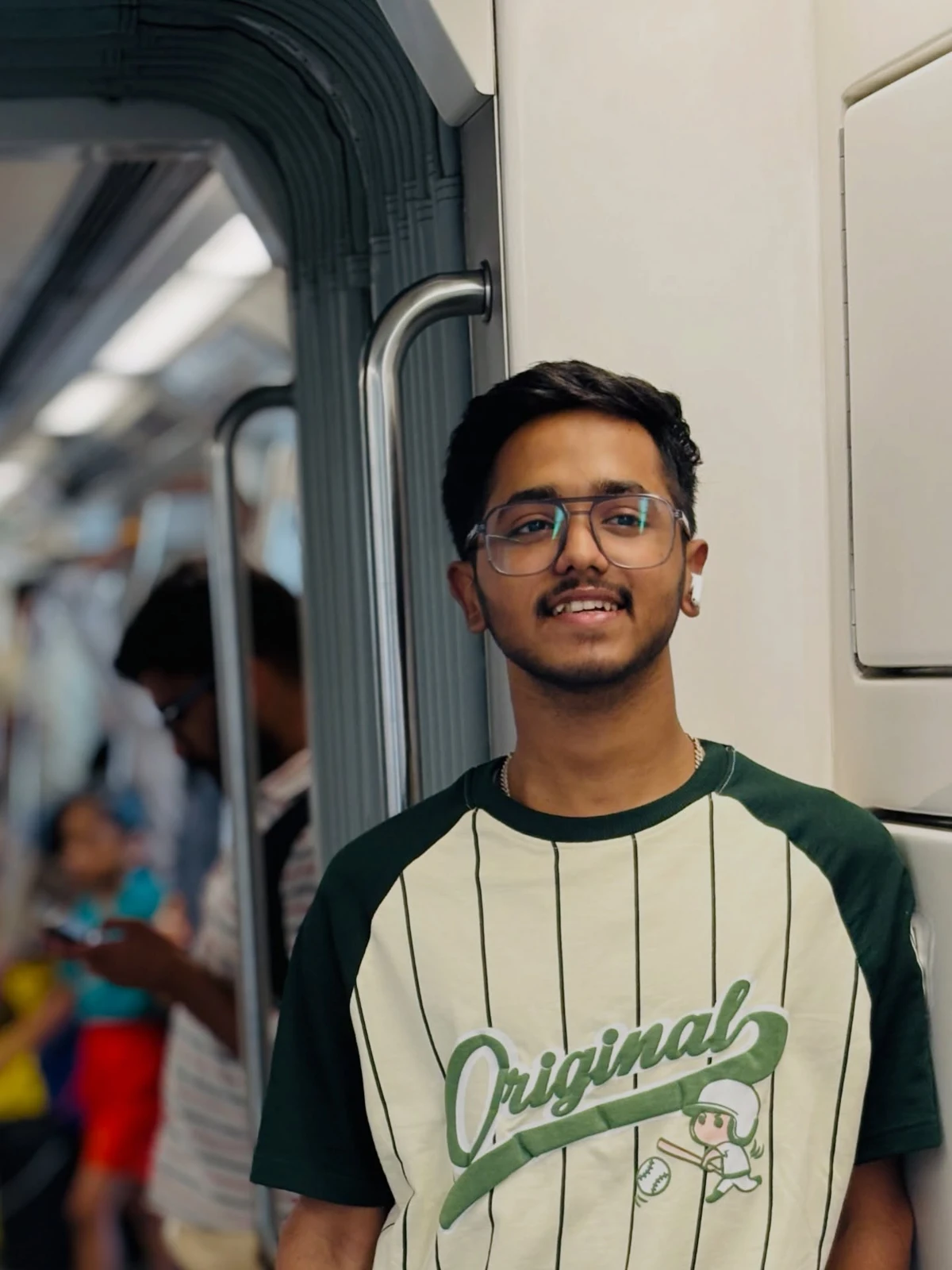 Harsh in a green and cream casual T-shirt