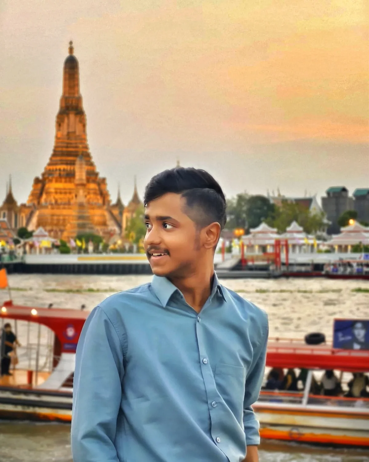 Harsh beside the river at Wat Arun, Bangkok